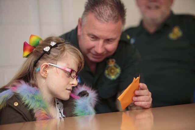 Elisha hills-steedman meets Paramedics that ultimately saved her life after a hit and run.,Peterborough Ambulance Station , Peterborough20/03/2017. Picture by Terry Harris / Peterborough Telegraph. THA