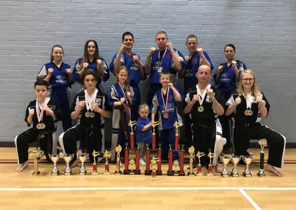 Pictured are some of the Peterborough BCKA fighters who have done well in recent competitions. From the left are, back,  Kelsey Lock, Abi Daulton, Colin Lock, Jordan Noble, Bradley King, Laura Parnell, front,  Ashton Brannigan, Eddy Paddock, Hannah Cameron, 2017 club mascot Kelsey King, Harvey King, Simon Munday and Freya Molloy.