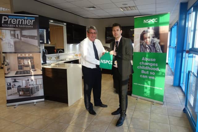 Iain Forsythe, managing director of Premier Kitchens & Bedrooms, with and Dan Irwin.