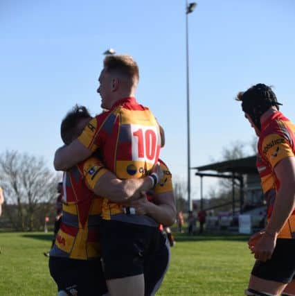Joe Andresen is congratulated after scoring a try against Belgrave. Picture: Kevin Goodacre