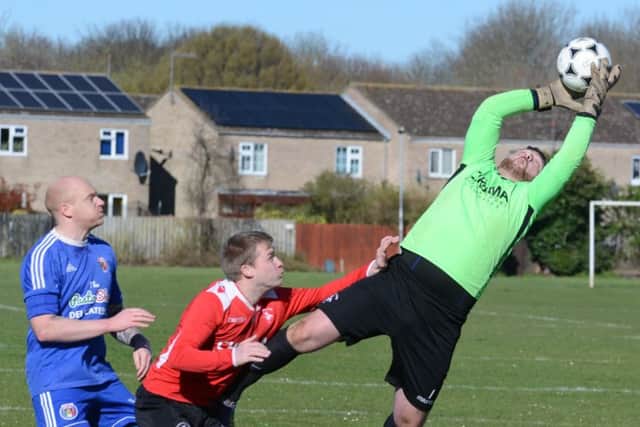 Action from the big cup tie between ICA Sports and Warboys Town. Photo: David Lowndes.