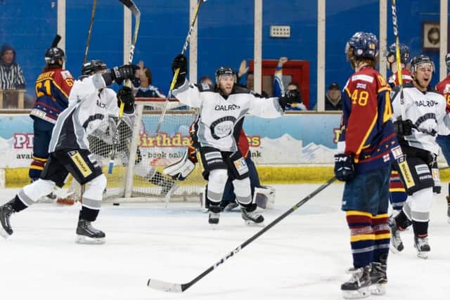 Wahebe Darge (right) celebrates his goal against Guildford. Tom Scott - AMOimages.com