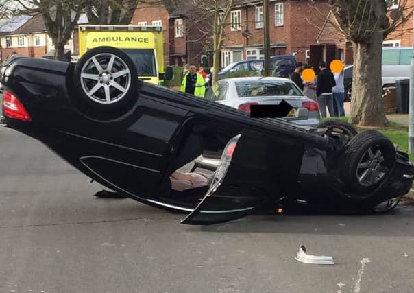 The overturned car in Chestnut Avenue - Photo: @RoadPoliceBCH