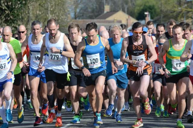 The start of Sundays Thorney 10k, won by Phil Martin (hand on watch).