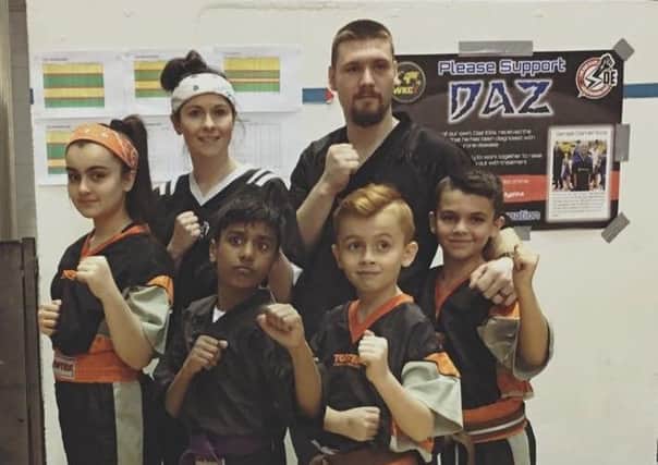 Hicks Karate School students who competed in the national championships. From the left they are, back, Jazmyn Popat-Evans, Atlanta Hickman, Micheal Evans, front, Rahim Ebrahim, Ginge Popat-Evans and Braydon Popat-Evans.