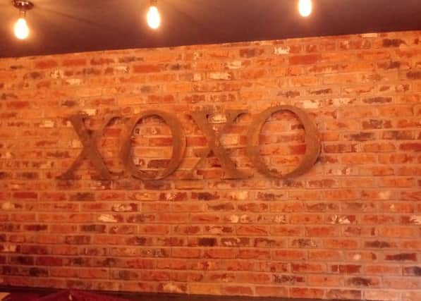 The XOXO logo on the wall inside.