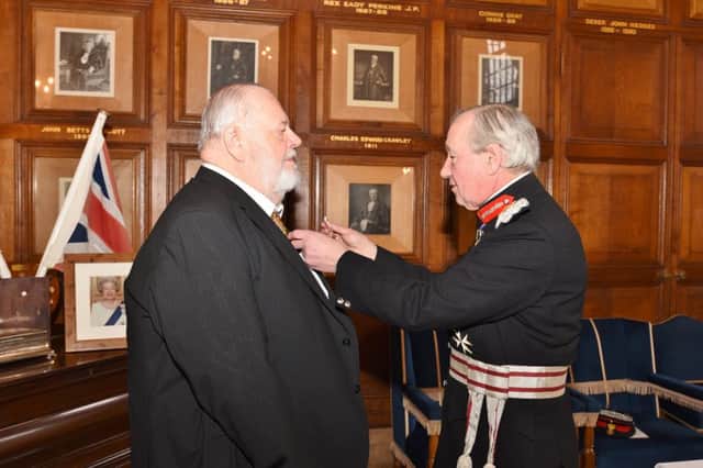 Investiture of the British Empire Medal by Sir Hugh Duberly, Lord Lieutenant of Cambs at the Town Hall to  Brian Gascoyne EMN-170327-230149009