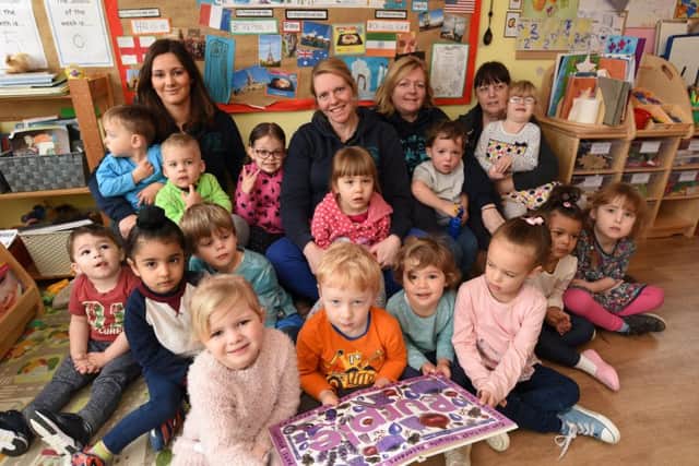 Staff and children at the Steppings Stones day nursery at Oakdale Avenue, Stanground which has just gained a Good OFSTED rating EMN-170328-173423009