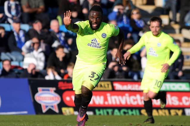 Junior Morias celebrates his winning goal at Gillingham. Photo: Joe Dent/theposh.com.
