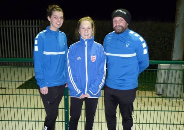 England Under 15 keeper Mollie Bull (centre) with Just4Keepers coaches Amy Martin and Ian Pledger.