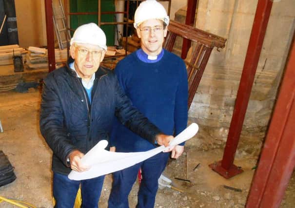Rev Stephen Webster, vicar of St Peters Church Oundle, right with  Malcolm Winder, St Peters Church PCC project manager. The hidden staircase, right.