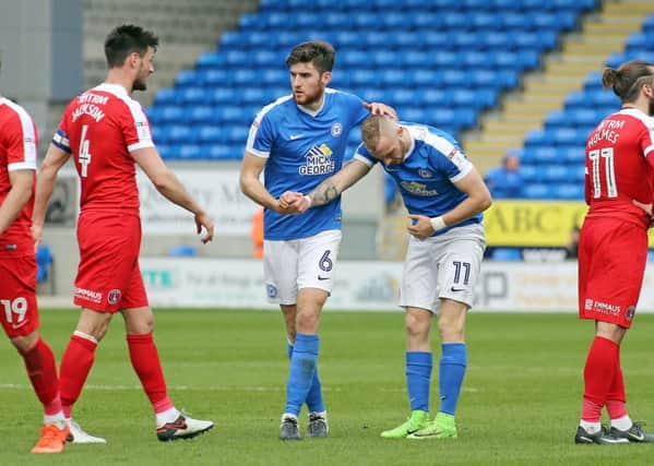 Posh star Marcus Maddison takes a bow in the company of Jack Baldwin during the 2-0 win over Charlton. Photo: Joe Dent/theposh.com.
