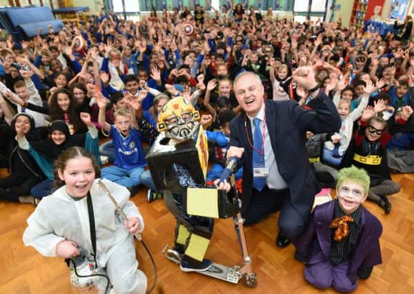 Stewart Jackson at St Thomas More RC primary school for the Sustrans superheroes day, part of the Big Pedal.  He is pictured at the front with pupils Zade Pjetergjokaj and Dexter and Jack Brackenbury EMN-170331-183642009