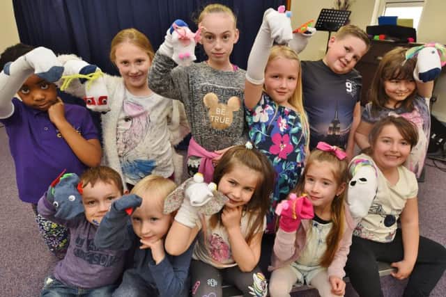 Open house cafÃ© at Whittlesey Christian Church. Children taking part in a puppet show EMN-170204-225914009