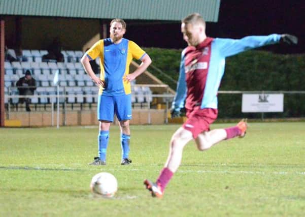 Scott Coupland converted a penalty for Deeping Rangers against Wisbech St Mary.