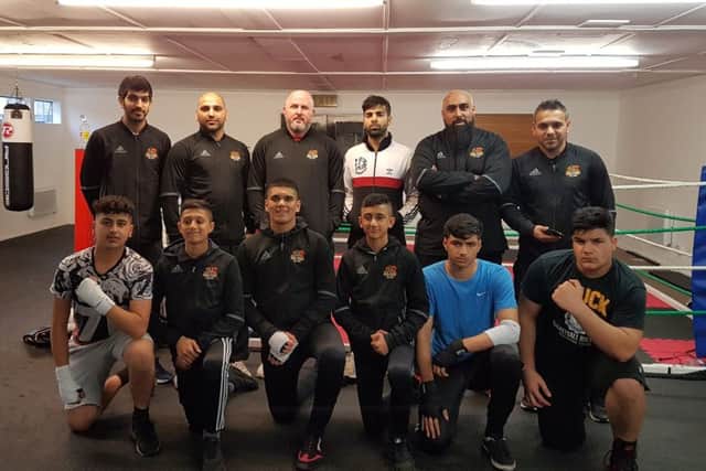 Some of the coaches and boxers at the new Top Yard School of Boxing.