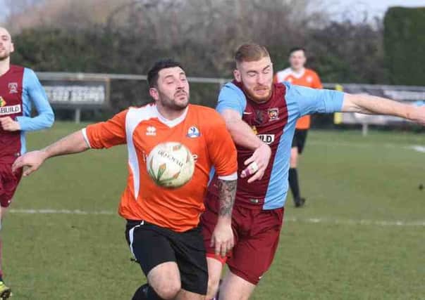Phil Stebbing (left) scored twice for Yaxley against Sileby.