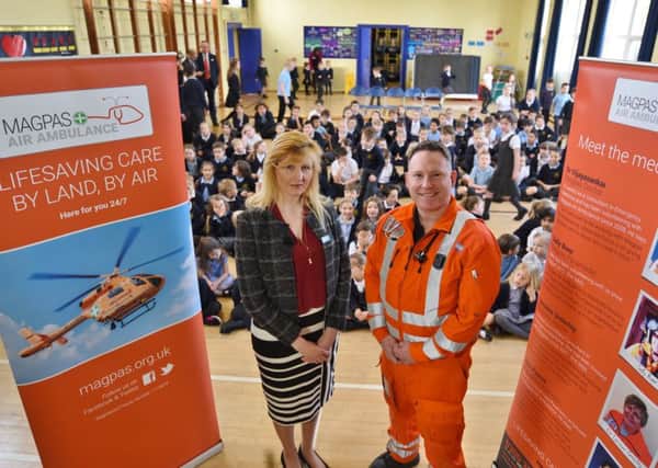 Louise Cade and MAGPAS Dr Andy Lindsay visiting Duke of Bedford primary school, Thorney to talk about road safety EMN-170504-154151009
