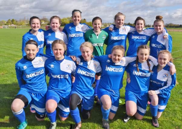 Pictured are Yaxley Girls Under 15s before their 7-0 win over city rivals Riverside in the Cambs Womens & Girls League. They are from the left, back,  Chloe Preston, Abbie Mason, Mia Chiarizia, Beth Yaxley, Amy Redhead, Sophie Groom-Smith, Gabby Hart, front, Chloe Rumble, Poppy Ludgate, Piper Hebditch, Tallula Green, Lara Price and Ellie McGregor.