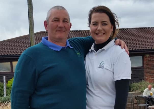 Greetham Valley captain James Ablett congratulates Emma Steele on her 25th Anniversary Trophy win.