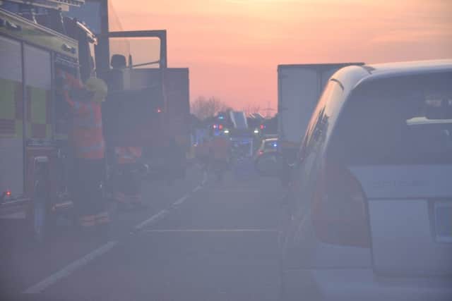 Fire crews rushing to the scene on the A47 at Castor last night. Photo: Earvin Sangalang