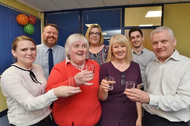 Deaf Blind UK, admin assistant Doreen Heath , who has worked there for 25 years. She is celebrating with some of her colleagues. EMN-170404-182054009