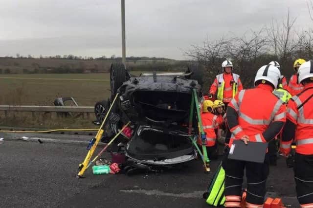 The scene on the A605 where the car overturned - Photo @roadpoliceBCH