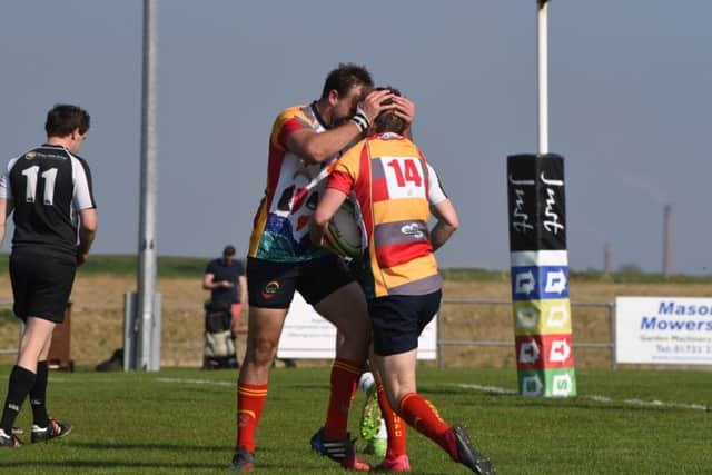 Luke Smedley is congratulated by Sarel Pretorious after scoring for Borough. Picture: Kevin Goodacre