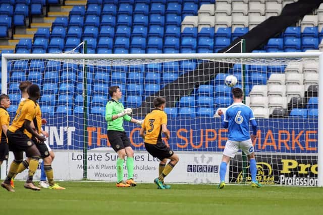 Andrew Hughes scores for Posh Reserves against Newport at the ABAX Stadium. Photo: Joe Dent/theposh.com.