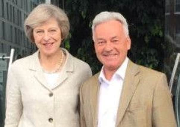 Prime Minister Theresa May with Rutland and Melton MP the Right Hon Sir Alan Duncan EMN-160720-095212001