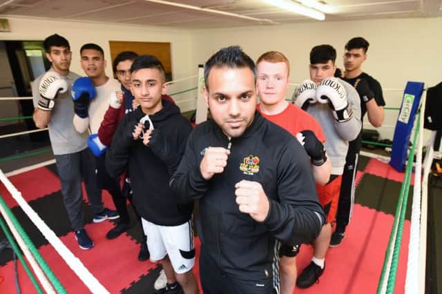 New boxing gym at New England which has suffered a break-in recently.  Omar Shaheen, Amaan Nadeem, Mustara Rafiq, Junayd Ali, Ballal Javed (who runs the gyum), Liam Halse, Krisz Horvath and Zain Shiraz EMN-171204-081816009