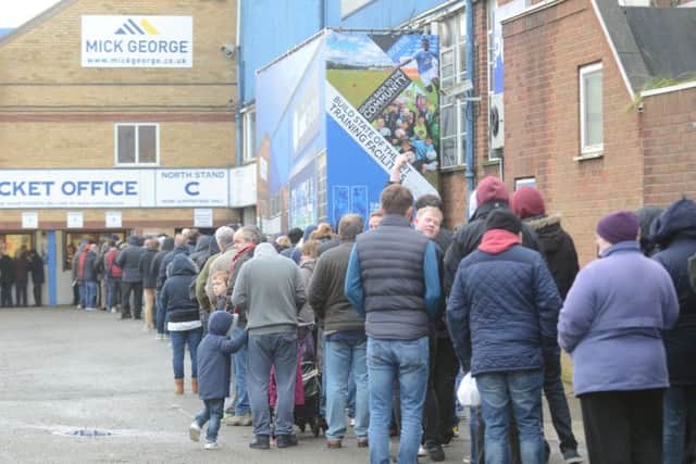 Posh fans queuing to buy tickets for the Chelsea FA Cup tie.