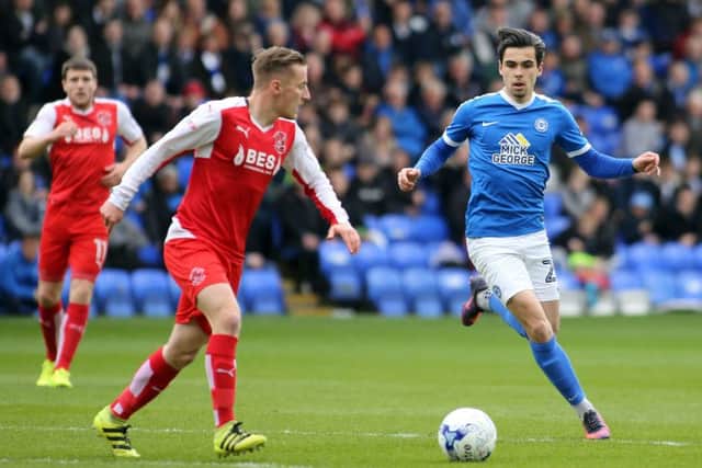 Posh midfielder Callum Chettle closes down a Fleetwood player. Photo: Joe Dent/theposh.com.