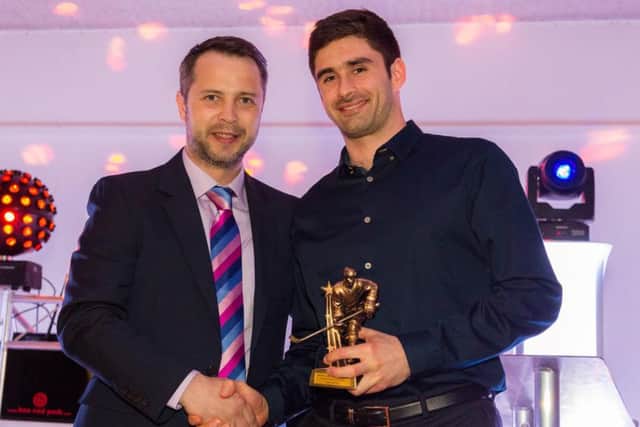 Robert Ferrara received the Coaches Player of the Year Award from Phantoms head coach Slava Koulikov. Picture: Tom Scott