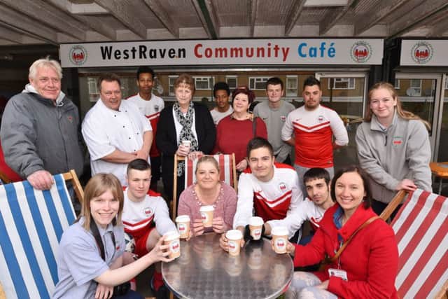 Chef Kevin Earl with volunteers and guests at the opening of the new West Haven Community Cafe at Hampton Court EMN-170417-191528009