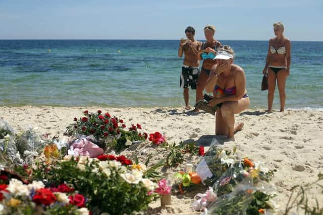 Tributes in Tunisia. Photo: PA EMN-150828-111226001