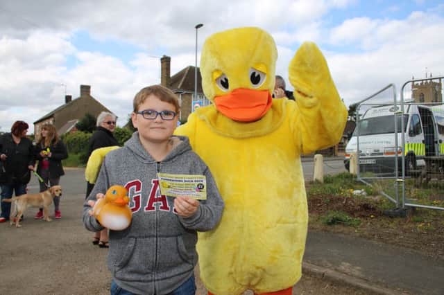 Danny Coxall pciks up the Â£50 prize for his brother Ben from Whit the Duck. Pic: RWT Photography