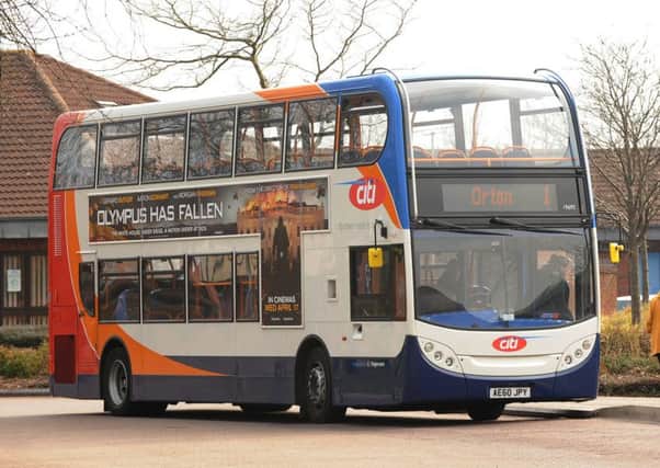 A Stagecoach bus stops at the Werrington Centre, where last Thursday a four year old girl was trapped in the doors of a number 1 bus. ENGEMN00120130904153807