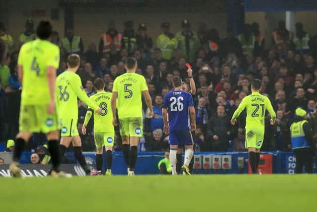 John Terry is sent off in the FA Cup tie against Posh.