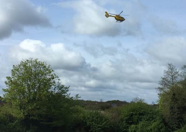 The air ambulance coming in to land in Orton Goldhay on Saturday. PHOTO: @squeazy