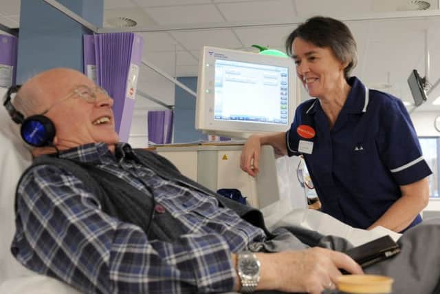 Christine Edwards, renal sister, with a patient