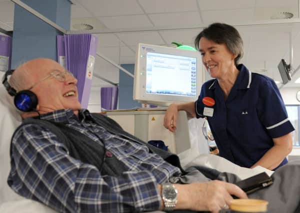 Christine Edwards, renal sister, with a patient