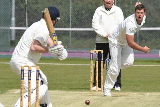 Peterborough Town fast bowler Joe Dawborn on his way to a five-wicket haul against Wollaston. Photo: David Lowndes.