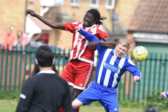 Ali Nyang of Peterborough Sports Reserves wins this header during a 1-0 win over Moulton Harrox. Photo: David Lowndes.