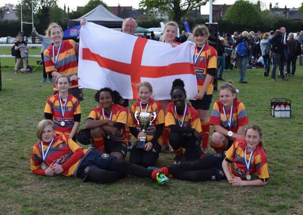 Borough Under 13 girls celebrate their big win yesterday.