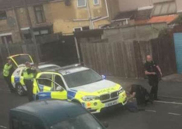 Police stop the vehicle on Harris Street, Photo: @Liampufc1996