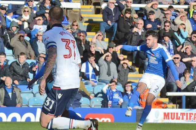 Michael Smith scores the wining goal for Posh against Bolton in November.