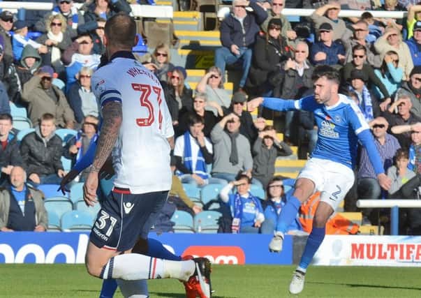Michael Smith scores the wining goal for Posh against Bolton in November.