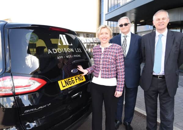 Addison Lee's chief operating officer Catherine Faiers with Peterborough City Council leader Cllr John Holdich and Peterborough MP Stewart Jackson.
