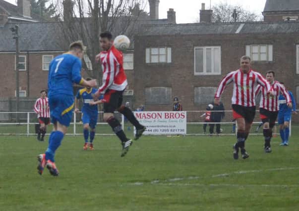Lee Beeson (7) scored with a firm header for Spalding against Stocksbridge Park Steels.